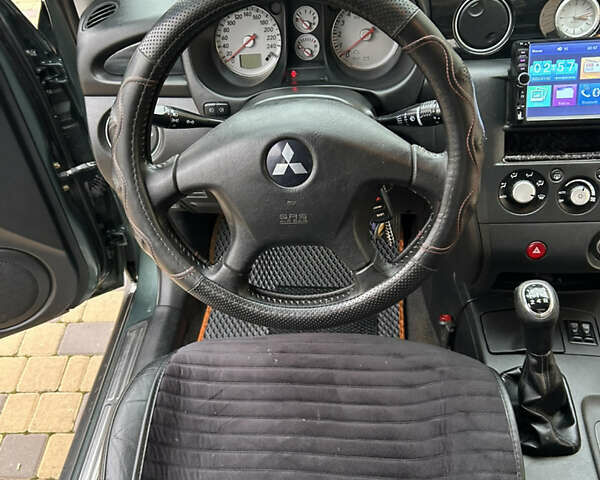 Зеленый Мицубиси Аутлендер, объемом двигателя 2.38 л и пробегом 250 тыс. км за 7200 $, фото 32 на Automoto.ua