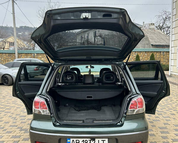 Зеленый Мицубиси Аутлендер, объемом двигателя 2.38 л и пробегом 250 тыс. км за 7200 $, фото 39 на Automoto.ua