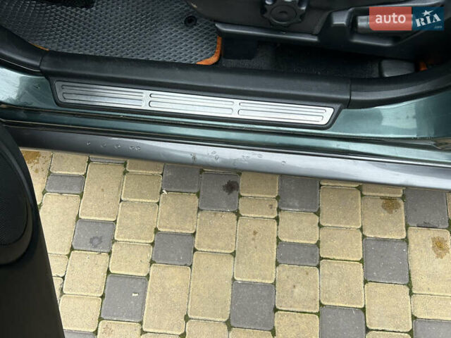 Зеленый Мицубиси Аутлендер, объемом двигателя 2.38 л и пробегом 250 тыс. км за 7200 $, фото 9 на Automoto.ua