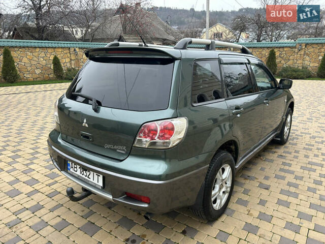 Зеленый Мицубиси Аутлендер, объемом двигателя 2.38 л и пробегом 250 тыс. км за 7200 $, фото 19 на Automoto.ua