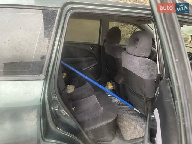 Зелений Міцубісі Аутлендер, об'ємом двигуна 2.4 л та пробігом 300 тис. км за 5000 $, фото 1 на Automoto.ua