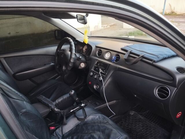 Зелений Міцубісі Аутлендер, об'ємом двигуна 2.4 л та пробігом 3 тис. км за 6500 $, фото 6 на Automoto.ua