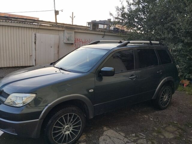 Зелений Міцубісі Аутлендер, об'ємом двигуна 2.4 л та пробігом 3 тис. км за 6500 $, фото 1 на Automoto.ua