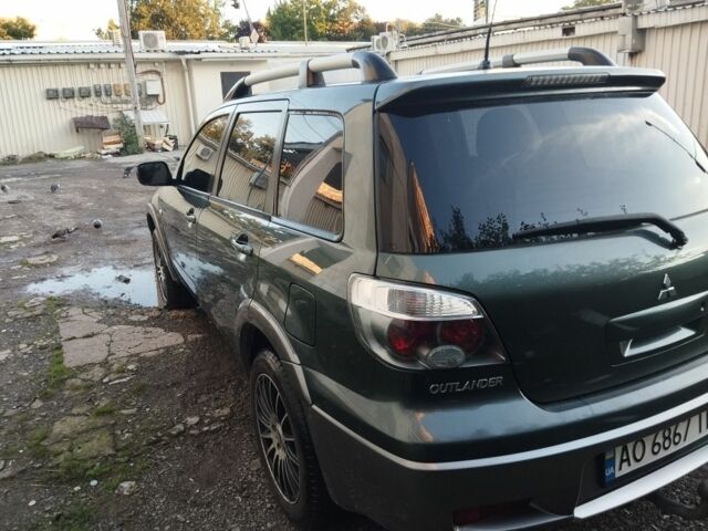 Зелений Міцубісі Аутлендер, об'ємом двигуна 2.4 л та пробігом 3 тис. км за 6500 $, фото 5 на Automoto.ua