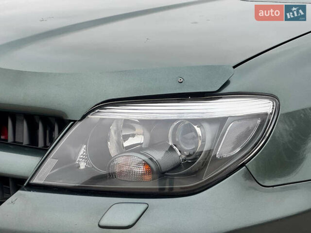 Зеленый Мицубиси Аутлендер, объемом двигателя 2 л и пробегом 194 тыс. км за 6350 $, фото 4 на Automoto.ua