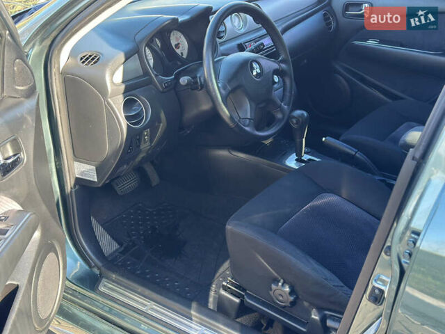 Міцубісі Аутлендер 2006 у Києві на Automoto.ua Зелений Міцубісі Аутлендер, об'ємом двигуна 2.4 л та пробігом 275 тис. км за 7350 $, фото 35 на Automoto.ua