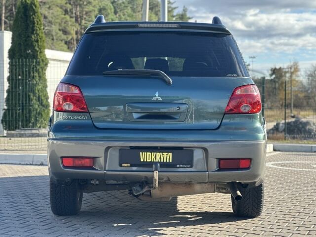 Міцубісі Аутлендер 2006 у Києві на Automoto.ua Зелений Міцубісі Аутлендер, об'ємом двигуна 2.4 л та пробігом 275 тис. км за 7350 $, фото 6 на Automoto.ua