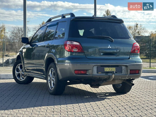 Міцубісі Аутлендер 2006 у Києві на Automoto.ua Зелений Міцубісі Аутлендер, об'ємом двигуна 2.4 л та пробігом 275 тис. км за 7350 $, фото 20 на Automoto.ua