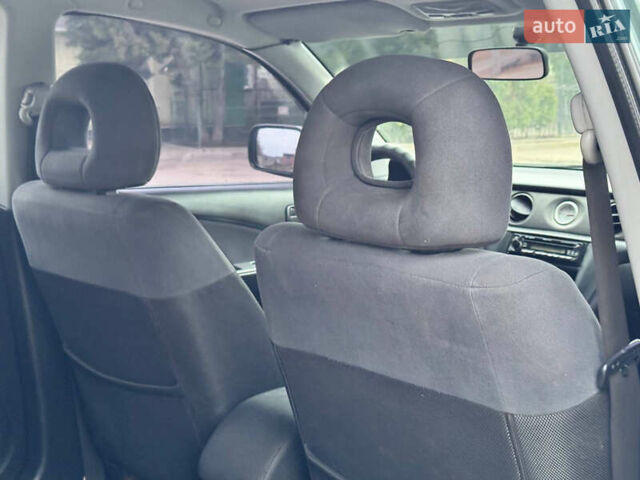 Зеленый Мицубиси Аутлендер, объемом двигателя 2 л и пробегом 194 тыс. км за 6350 $, фото 29 на Automoto.ua