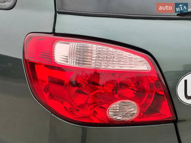 Зеленый Мицубиси Аутлендер, объемом двигателя 2 л и пробегом 194 тыс. км за 6350 $, фото 13 на Automoto.ua