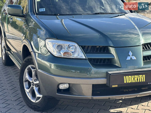 Міцубісі Аутлендер 2006 у Києві на Automoto.ua Зелений Міцубісі Аутлендер, об'ємом двигуна 2.4 л та пробігом 275 тис. км за 7350 $, фото 7 на Automoto.ua