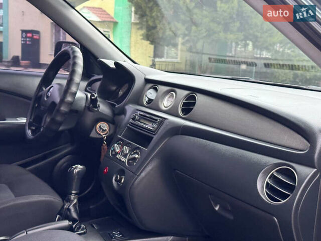 Зеленый Мицубиси Аутлендер, объемом двигателя 2 л и пробегом 194 тыс. км за 6350 $, фото 35 на Automoto.ua