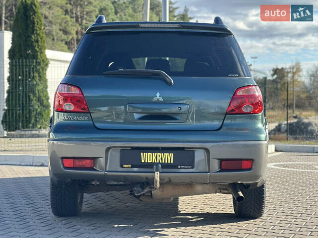 Міцубісі Аутлендер 2006 у Києві на Automoto.ua Зелений Міцубісі Аутлендер, об'ємом двигуна 2.4 л та пробігом 275 тис. км за 7350 $, фото 13 на Automoto.ua