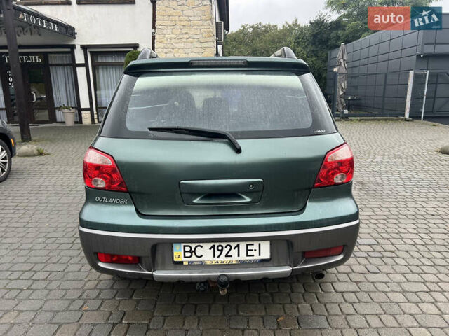 Зеленый Мицубиси Аутлендер, объемом двигателя 2.38 л и пробегом 213 тыс. км за 5999 $, фото 9 на Automoto.ua