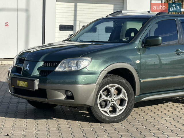 Міцубісі Аутлендер 2006 у Києві на Automoto.ua Зелений Міцубісі Аутлендер, об'ємом двигуна 2.4 л та пробігом 275 тис. км за 7350 $, фото 5 на Automoto.ua