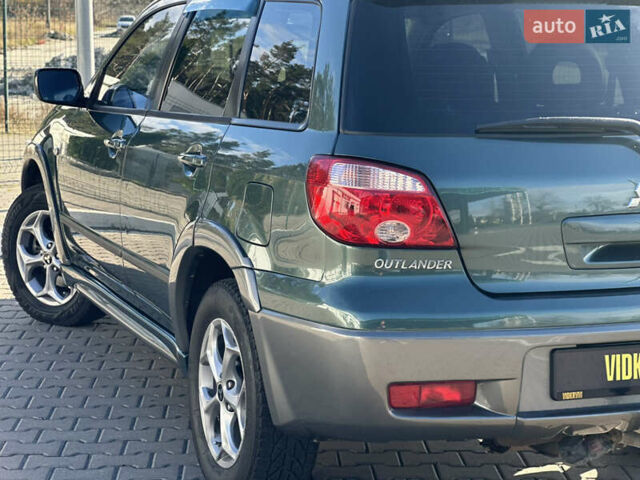 Міцубісі Аутлендер 2006 у Києві на Automoto.ua Зелений Міцубісі Аутлендер, об'ємом двигуна 2.4 л та пробігом 275 тис. км за 7350 $, фото 18 на Automoto.ua
