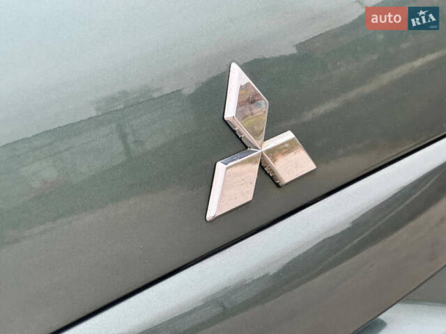 Зеленый Мицубиси Аутлендер, объемом двигателя 2 л и пробегом 194 тыс. км за 6350 $, фото 14 на Automoto.ua