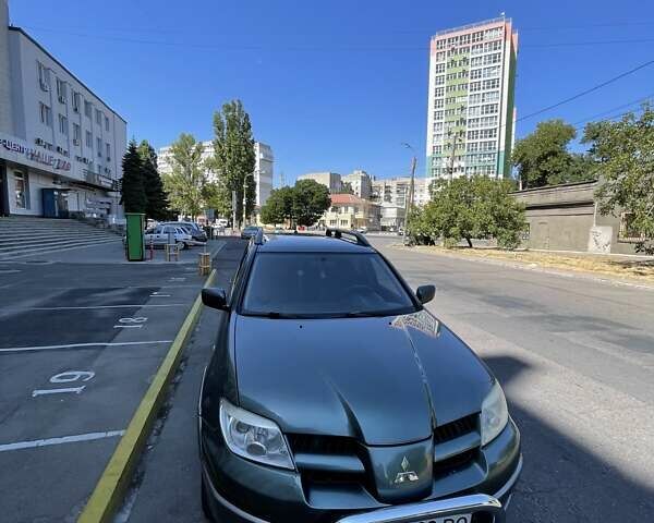 Зеленый Мицубиси Аутлендер, объемом двигателя 2.4 л и пробегом 313 тыс. км за 6200 $, фото 14 на Automoto.ua