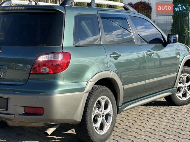 Міцубісі Аутлендер 2006 у Києві на Automoto.ua Зелений Міцубісі Аутлендер, об'ємом двигуна 2.4 л та пробігом 275 тис. км за 7350 $, фото 17 на Automoto.ua
