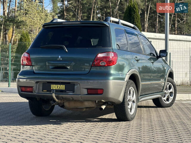 Міцубісі Аутлендер 2006 у Києві на Automoto.ua Зелений Міцубісі Аутлендер, об'ємом двигуна 2.4 л та пробігом 275 тис. км за 7350 $, фото 16 на Automoto.ua