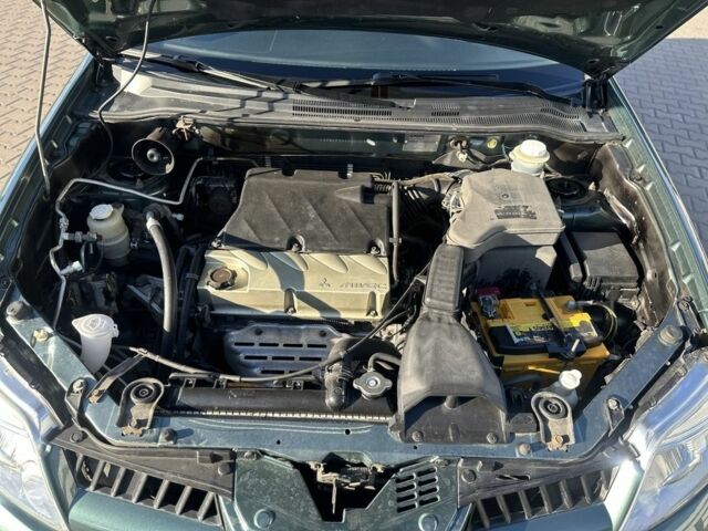 Міцубісі Аутлендер 2006 у Києві на Automoto.ua Зелений Міцубісі Аутлендер, об'ємом двигуна 2.4 л та пробігом 275 тис. км за 7350 $, фото 9 на Automoto.ua