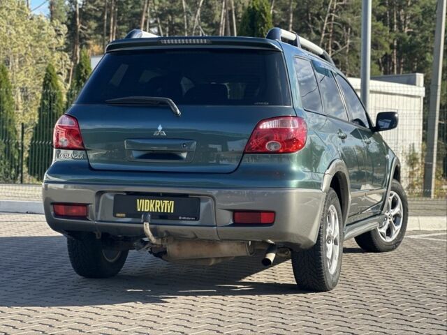 Міцубісі Аутлендер 2006 у Києві на Automoto.ua Зелений Міцубісі Аутлендер, об'ємом двигуна 2.4 л та пробігом 275 тис. км за 7350 $, фото 5 на Automoto.ua