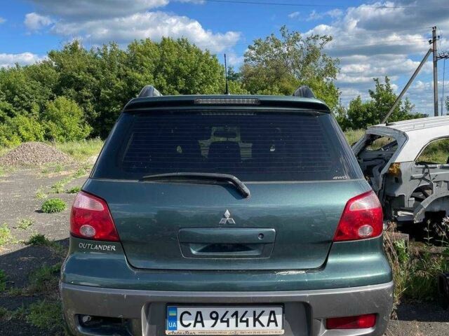 Зелений Міцубісі Аутлендер, об'ємом двигуна 2.4 л та пробігом 240 тис. км за 3000 $, фото 1 на Automoto.ua