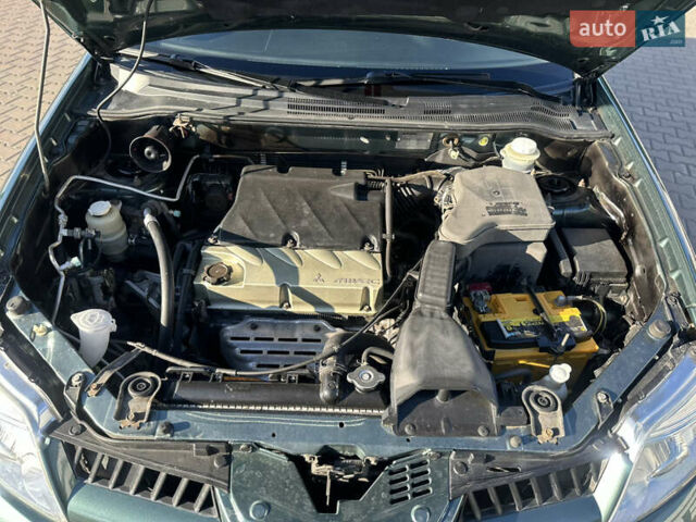 Міцубісі Аутлендер 2006 у Києві на Automoto.ua Зелений Міцубісі Аутлендер, об'ємом двигуна 2.4 л та пробігом 275 тис. км за 7350 $, фото 21 на Automoto.ua