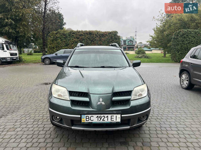 Зеленый Мицубиси Аутлендер, объемом двигателя 2.38 л и пробегом 213 тыс. км за 5999 $, фото 8 на Automoto.ua