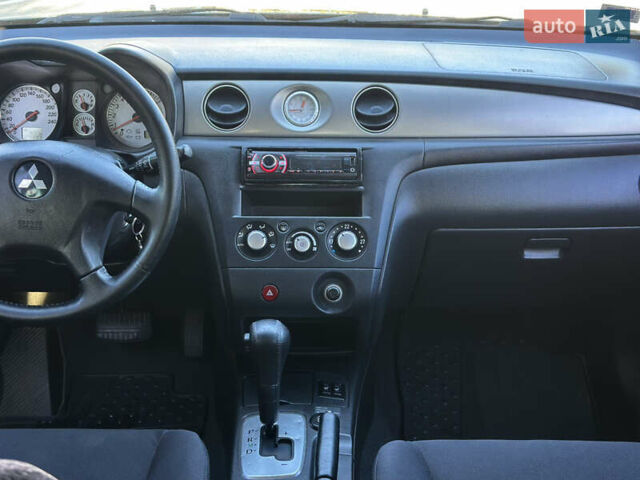 Міцубісі Аутлендер 2006 у Києві на Automoto.ua Зелений Міцубісі Аутлендер, об'ємом двигуна 2.4 л та пробігом 275 тис. км за 7350 $, фото 26 на Automoto.ua