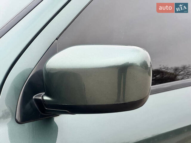 Зеленый Мицубиси Аутлендер, объемом двигателя 2 л и пробегом 194 тыс. км за 6350 $, фото 7 на Automoto.ua