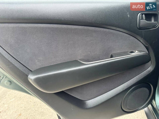 Зеленый Мицубиси Аутлендер, объемом двигателя 2 л и пробегом 194 тыс. км за 6350 $, фото 23 на Automoto.ua