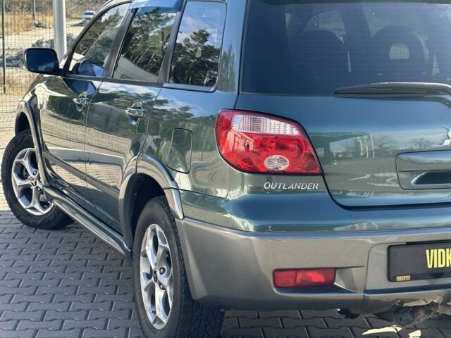 Міцубісі Аутлендер 2006 у Києві на Automoto.ua Зелений Міцубісі Аутлендер, об'ємом двигуна 2.4 л та пробігом 275 тис. км за 7350 $, фото 8 на Automoto.ua