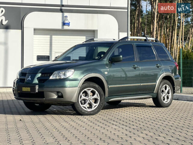 Міцубісі Аутлендер 2006 у Києві на Automoto.ua Зелений Міцубісі Аутлендер, об'ємом двигуна 2.4 л та пробігом 275 тис. км за 7350 $, фото 4 на Automoto.ua