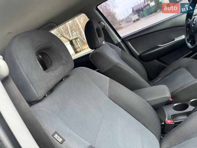 Зеленый Мицубиси Аутлендер, объемом двигателя 2 л и пробегом 194 тыс. км за 6350 $, фото 37 на Automoto.ua