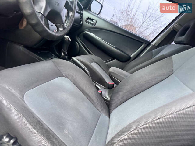 Зеленый Мицубиси Аутлендер, объемом двигателя 2 л и пробегом 194 тыс. км за 6350 $, фото 20 на Automoto.ua