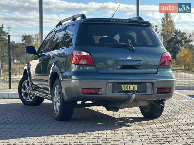 Міцубісі Аутлендер 2006 у Києві на Automoto.ua Зелений Міцубісі Аутлендер, об'ємом двигуна 2.4 л та пробігом 275 тис. км за 7350 $, фото 19 на Automoto.ua