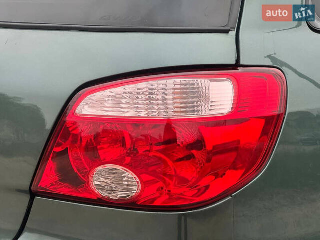 Зеленый Мицубиси Аутлендер, объемом двигателя 2 л и пробегом 194 тыс. км за 6350 $, фото 12 на Automoto.ua