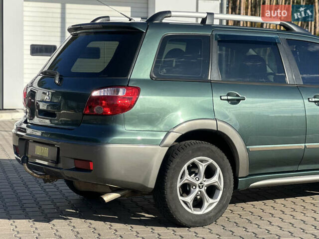 Міцубісі Аутлендер 2006 у Києві на Automoto.ua Зелений Міцубісі Аутлендер, об'ємом двигуна 2.4 л та пробігом 275 тис. км за 7350 $, фото 11 на Automoto.ua