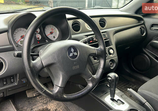 Зеленый Мицубиси Аутлендер, объемом двигателя 2.38 л и пробегом 213 тыс. км за 5999 $, фото 7 на Automoto.ua