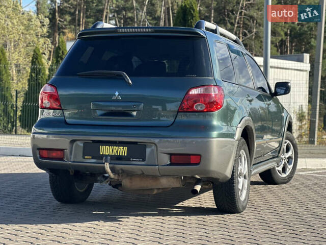 Міцубісі Аутлендер 2006 у Києві на Automoto.ua Зелений Міцубісі Аутлендер, об'ємом двигуна 2.4 л та пробігом 275 тис. км за 7350 $, фото 15 на Automoto.ua