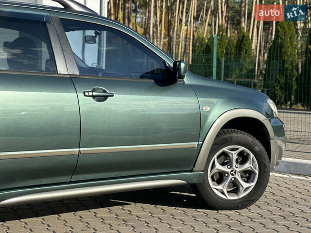 Міцубісі Аутлендер 2006 у Києві на Automoto.ua Зелений Міцубісі Аутлендер, об'ємом двигуна 2.4 л та пробігом 275 тис. км за 7350 $, фото 12 на Automoto.ua