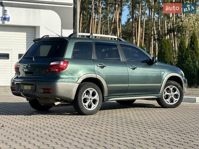 Міцубісі Аутлендер 2006 у Києві на Automoto.ua Зелений Міцубісі Аутлендер, об'ємом двигуна 2.4 л та пробігом 275 тис. км за 7350 $, фото 10 на Automoto.ua