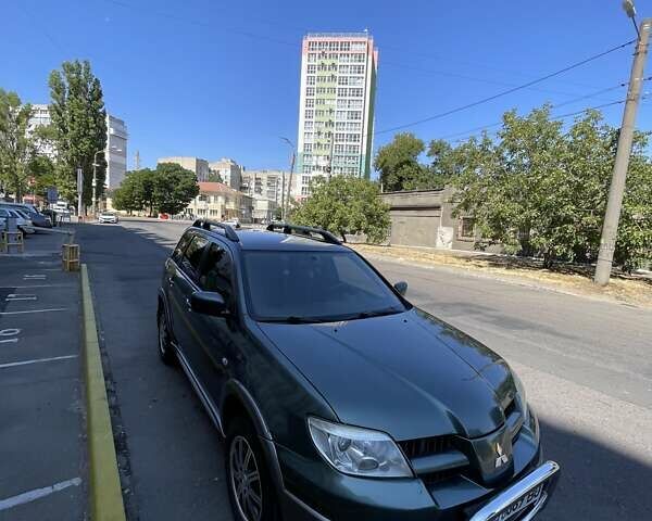 Зеленый Мицубиси Аутлендер, объемом двигателя 2.4 л и пробегом 313 тыс. км за 6200 $, фото 13 на Automoto.ua