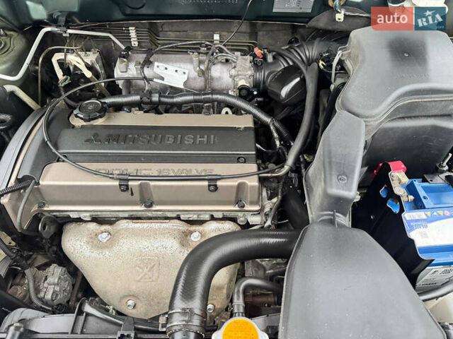 Зеленый Мицубиси Аутлендер, объемом двигателя 2 л и пробегом 194 тыс. км за 6350 $, фото 46 на Automoto.ua