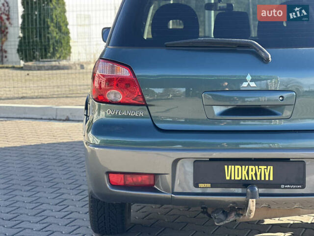 Міцубісі Аутлендер 2006 у Києві на Automoto.ua Зелений Міцубісі Аутлендер, об'ємом двигуна 2.4 л та пробігом 275 тис. км за 7350 $, фото 14 на Automoto.ua