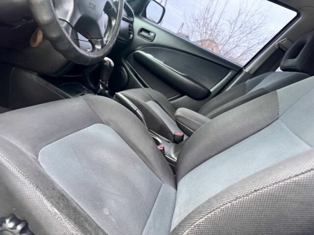 Зелений Міцубісі Аутлендер, об'ємом двигуна 2 л та пробігом 194 тис. км за 6350 $, фото 9 на Automoto.ua