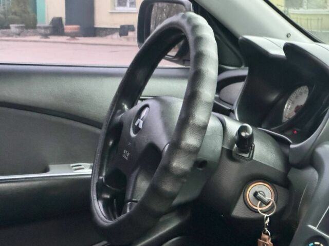 Зелений Міцубісі Аутлендер, об'ємом двигуна 2 л та пробігом 194 тис. км за 6350 $, фото 20 на Automoto.ua