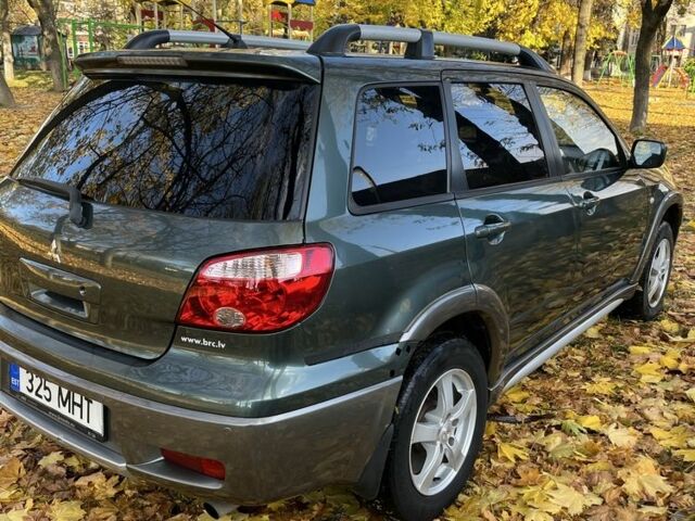 Міцубісі Аутлендер 2007 у Тульчине на Automoto.ua Зелений Міцубісі Аутлендер, об'ємом двигуна 2.4 л та пробігом 147 тис. км за 4550 $, фото 4 на Automoto.ua