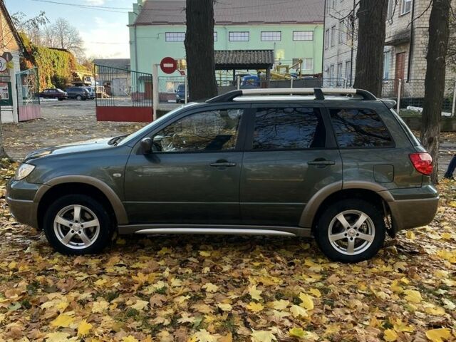 Міцубісі Аутлендер 2007 у Тульчине на Automoto.ua Зелений Міцубісі Аутлендер, об'ємом двигуна 2.4 л та пробігом 147 тис. км за 4550 $, фото 7 на Automoto.ua